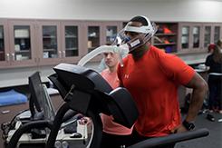 Student runs on treadmill